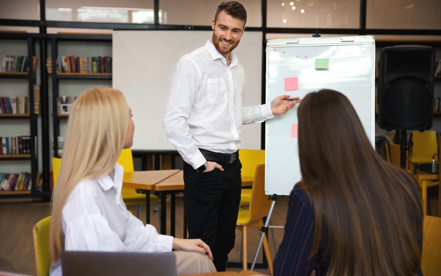 Participant working through financial analysis exercises in a practical learning environment